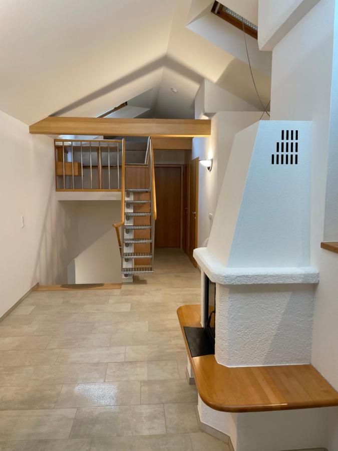 Undertheroof At *
